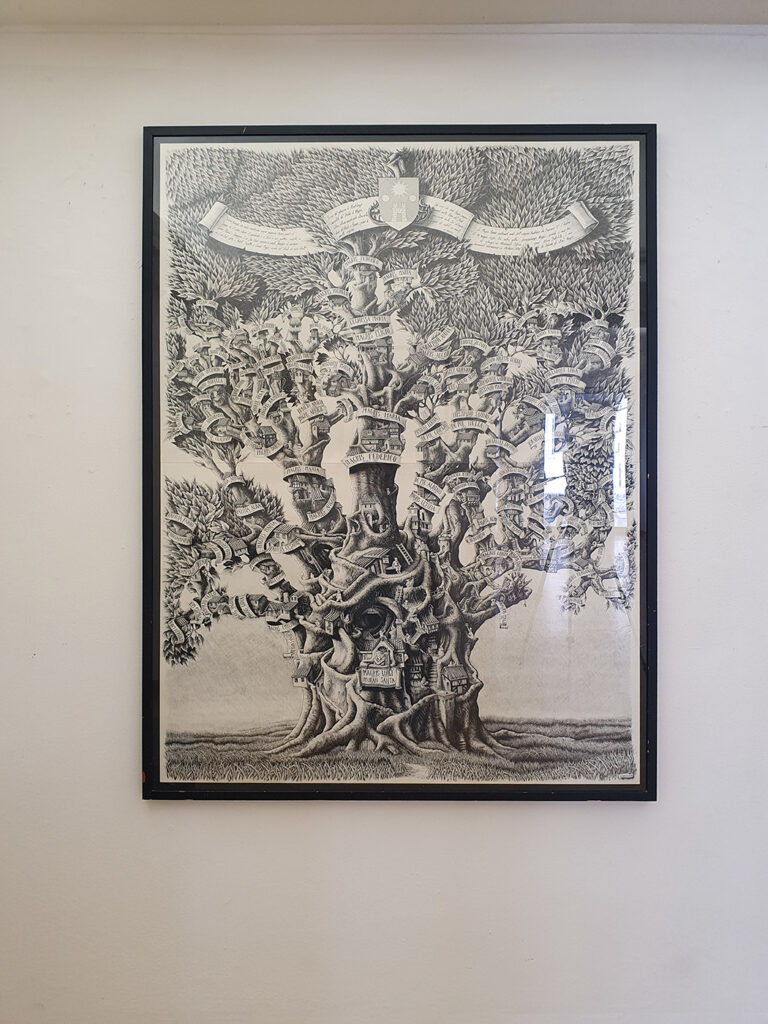 Photograph taken at an exhibition by the Italian artist Massimo Cravich, featuring one of his famous family trees